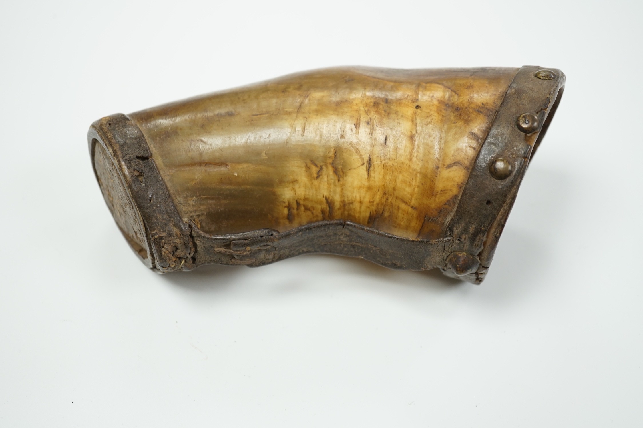 A 19th century ox horn and leather mounted cup, 19cm